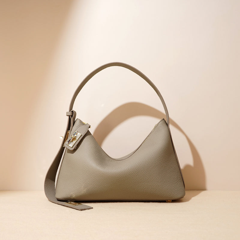 Leather handbags are fashionable.