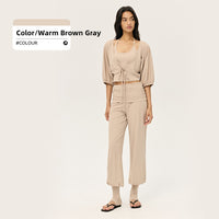 Women?s casual sportswear set: loose-fitting, figure-flattering tunic paired with footless leggings
